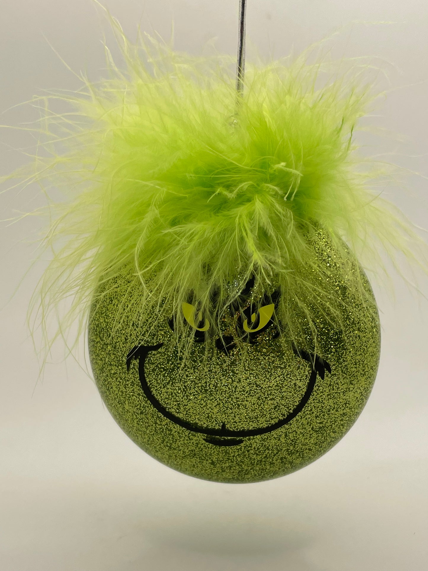 Oh Those Grinchie Eyes and Smirky Smile and Green Hair Handmade Glass Ornament